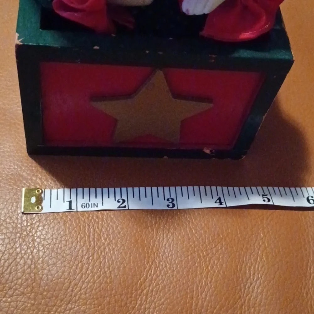 - Vintage Colorful Clown Jack-in-the-Box Toy